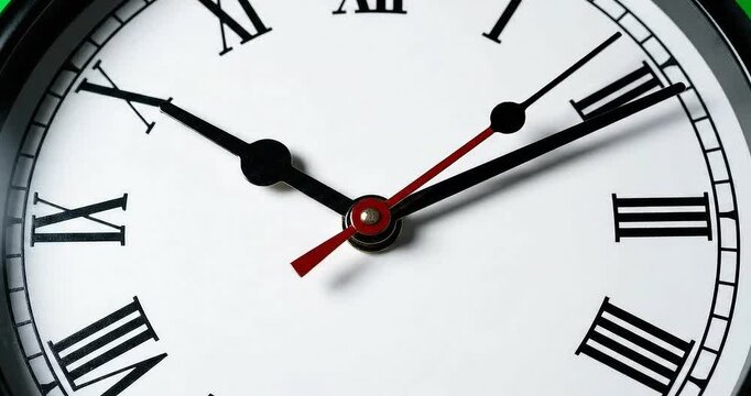 Close up video of three analog clocks with roman numerals ticking away in real time showcasing white clock faces with black hands and red second hands on a blurred background