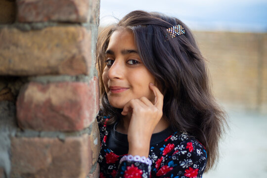 Cute Malalai Jan, a Pashtun Girl indoor natural shots.