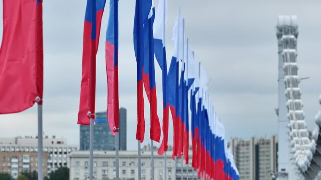 Russian Federation flags flying in Moscow during a national celebration event