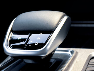 Gear shift with the letters P, N, D, and R on it