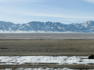 Snowy mountain range is in the background