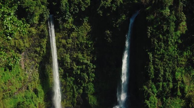 Phou Sawan waterfall near Pakse in Laos, tropical nature landscape and scenic rainforest