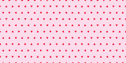 Small hearts red polka dots seamless pattern. Cute pattern with random hearts for wrapping paper, wallpaper, fabric.