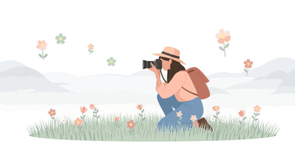 Female Photographer Capturing Floral Scenery with Hat in Meadow During Daytime