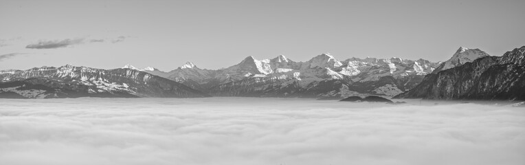 Panorama of the Swiss alps over the fog