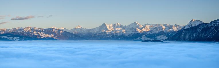 Panorama of the Swiss alps over the fog