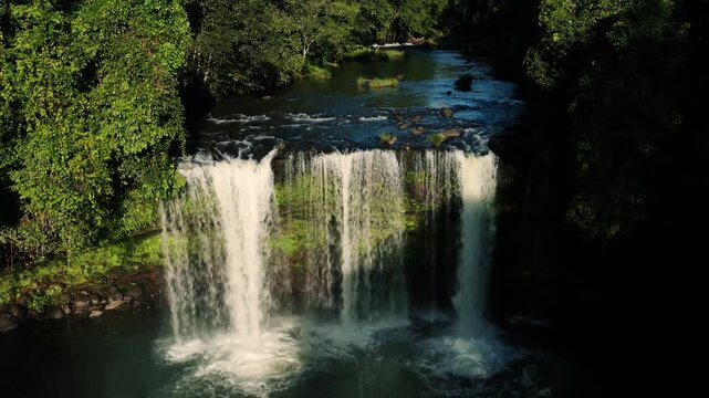 Phou Sawan waterfall near Pakse in Laos, tropical nature landscape and scenic rainforest
