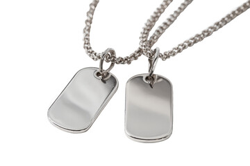 Fototapeta premium Silver dog tag necklaces isolated on transparent background. Close-up view of two shiny silver dog tag necklaces isolated on white background.
