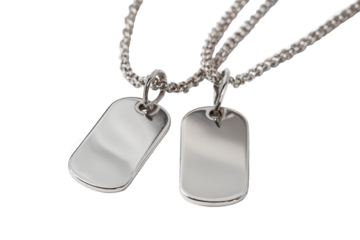 Silver dog tag necklaces isolated on transparent background. Close-up view of two shiny silver dog tag necklaces isolated on white background.