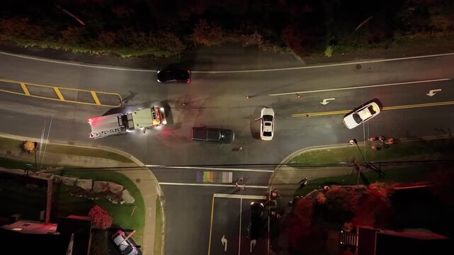 Top View Law Enforcement And Emergency Crews Respond To Night Road Accident In Beechville Halifax Nova Scotia Canada With Vehicles And Safety Lights. Aerial view