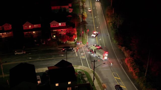 Aerial view Serious Nighttime Traffic Incident In Beechville Near Halifax Nova Scotia Canada With Police, Firefighters, And Vehicle Recovery In Progress.