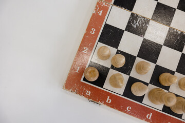 Chess pieces arranged on a classic board ready for an exciting match