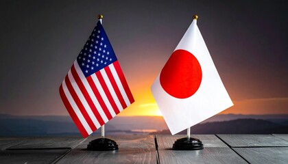United States and Japan National Flags on Desk Stands with Sunset Sky Background