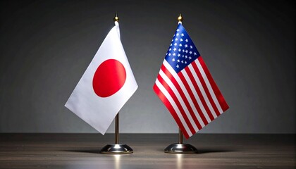 United States and Japan National Flags on Desk Stands with Sunset Sky Background