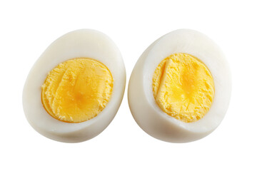 Halves of a hard boiled egg isolated on transparent background. Two halves of a perfectly cooked hard-boiled egg yolk isolated on white background.