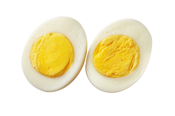 Halves of a hard boiled egg isolated on transparent background. Two halves of a boiled egg with yellow yolk isolated on white background.