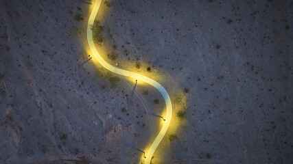 Obraz premium Aerial Illuminated Walking Path at Blue Hour Lone Mountain Park Las Vegas