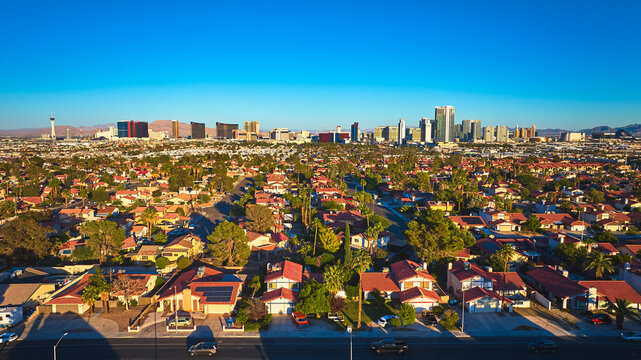 Aerial Las Vegas Suburbs Residential Neighborhood and The Strip at Golden Hour