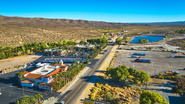 Aerial Nevada Desert Roadside Stop and Commercial Buildings Beatty