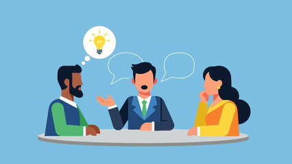 Three People Discussing Idea at Table.