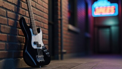 Black electric bass guitar leans against a brick wall in a neon-lit urban alley at night