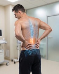 Obraz premium Spine Care and Pain Management Concept With Adult Man