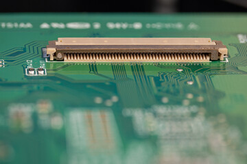 A large connector on a printed circuit board.
