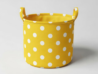 Bright yellow fabric basket with white polka dots