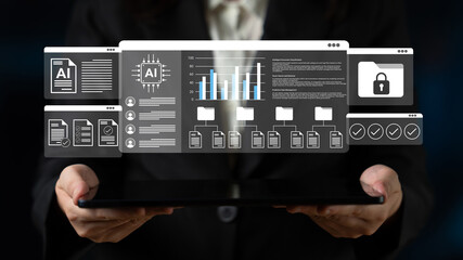 A professional holds a tablet displaying advanced data analysis interfaces, showcasing artificial intelligence visualizations and key business insights for technology utilization. Gantry