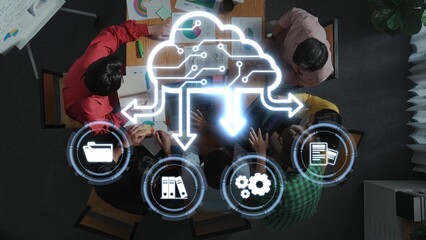 A diverse team collaborates in an office setting, with a cloud computing graphic overlay, symbolizing modern technology and innovative business strategies. Raster