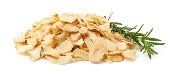 Pile of dried garlic flakes and rosemary isolated on white