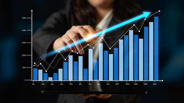 A business professional showcases data visualization with a growing graph, highlighting success and performance metrics, emphasizing strategic growth and analytics. Scalp - Powered by Adobe