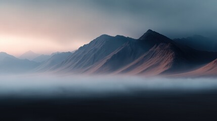 A serene mountain range enveloped in mist and soft hues, showcasing delicate ridges that reflect peacefulness and the untouched beauty of nature's vast wilderness.