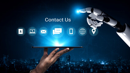 A futuristic robot hand reaches for a tablet displaying contact icons, symbolizing advanced communication technology in a digital business world. Gantry