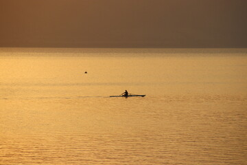Boat at sunset in the Galilee sea