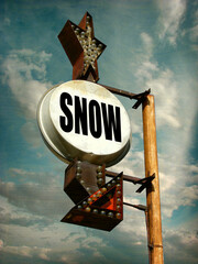 Old worn rusted snow sign