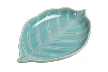 Teal ceramic leaf shaped dish plate isolated on a transparent background