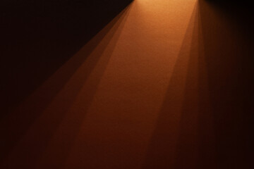 Paper abstraction. Play of light and shadow on brown cardboard