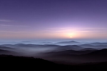 Fototapeta premium Sunrise over rolling hills with mist and soft light