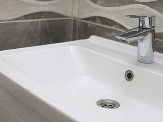 Fototapeta premium Modern Bathroom Sink with Chrome Faucet