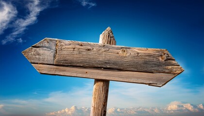 Old Wooden Signpost On Sky Background