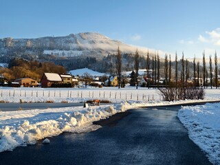 asphalt road in the village of Lhotka in winter