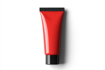 Zoomed in view of a blank red tube with a black cap ideal for toothpaste glue cream gel shampoo or cosmetic products set against a white background