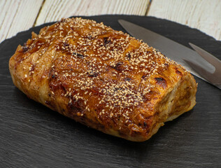 Vegan seitan roast- spicy wheat gluten as meat protein alternative