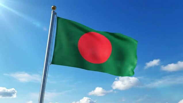 National flag of Bangladesh waving on a flagpole against a clear blue sky with white clouds and sunlight shining from the top left corner