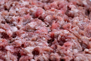Homely ambiance with rich meat preparations, Closeup of minced beef forming hearty everyday meals, Vivid image of finely chopped raw meat as comforting kitchen staple