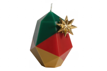 Colorful geometric candle with gold star isolated on a transparent background