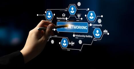 A hand holds a pen, interacting with a virtual networking concept. This image symbolizes...