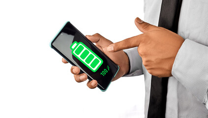 A hand pointing at a fully charged smartphone battery icon, symbolizing energy efficiency, mobile power and digital productivity.

