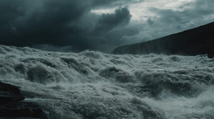 Dramatic landscape of surging water under a stormy sky background